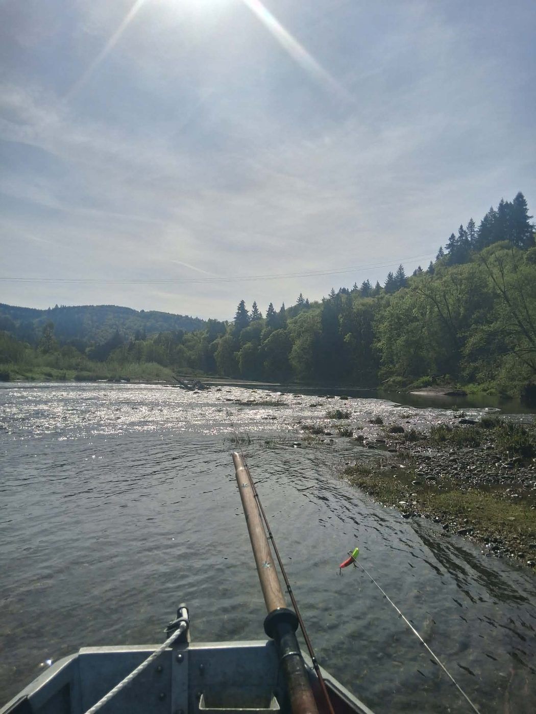 Early morning sun low over the Humptulips River, seen from a drift boat